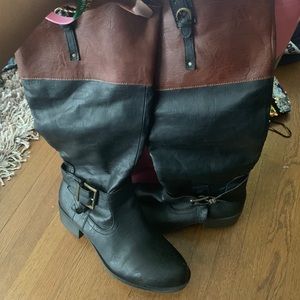 Black boots with brown trim